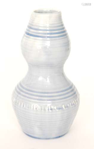 A Moorcroft Natural Pottery vase of double gourd form glazed in a pale blue