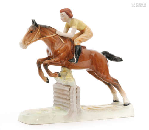 A Beswick Pottery figure of a Girl on a Jumping Horse