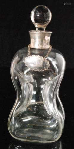 A George V hallmarked silver mounted glug glug decanter