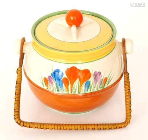 A Clarice Cliff Crocus pattern shape 335 biscuit barrel circa 1930 hand painted with Crocus sprays with yellow