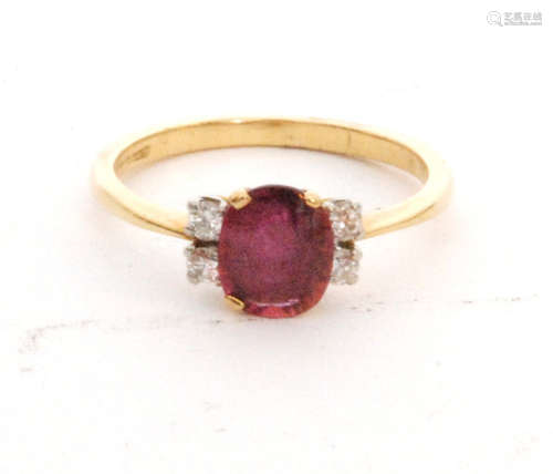 An 18ct hallmarked ruby and diamond ring