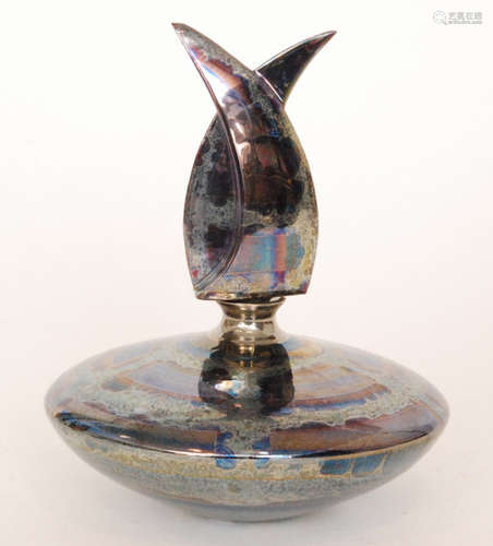 A contemporary Atkinson-Jones Lustreware perfume bottle of compressed angular form decorated in a blue and silver lustre with a conforming stopper