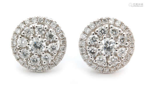 A modern pair of 18ct diamond cluster earrings