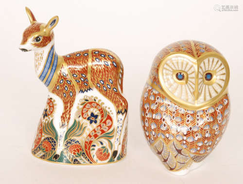 Two Royal Crown Derby paperweights comprising an owl and a fawn