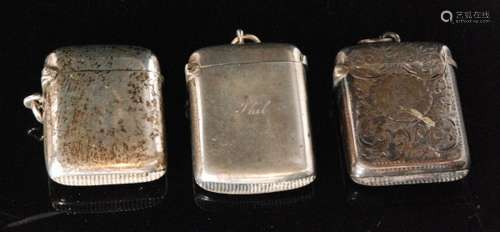 Three hallmarked silver cushioned rectangular vesta cases