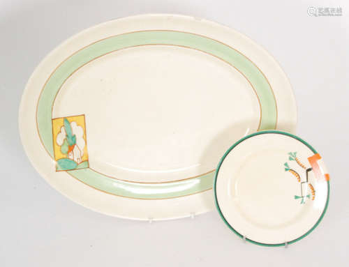 A large 1930s Clarice Cliff meat plate decorated in the Stroud pattern