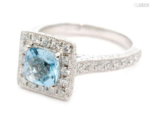 An Art Deco style platinum diamond and aquamarine ring