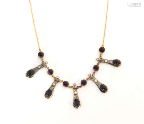 An amethyst and diamond fringe necklace in the Arts and Crafts taste