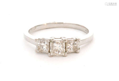 A contemporary platinum diamond three stone ring