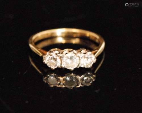 An 18ct three stone diamond ring