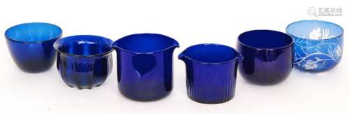 A 19th Century Bristol blue glass rinser of tapering from with basal slice cutting