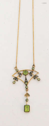 A peridot and diamond openwork pendant