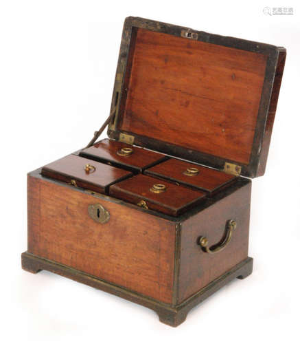 A 19th Century mahogany crossbanded tea caddy with twin brass drop handles above bracket feet