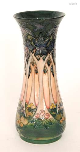 A large Moorcroft Pottery vase of tapering form decorated in the Cluny pattern designed by Sally Tuffin