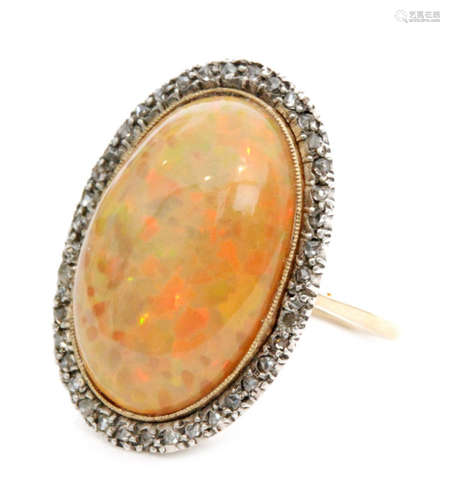 An 18ct gold opal and diamond ring