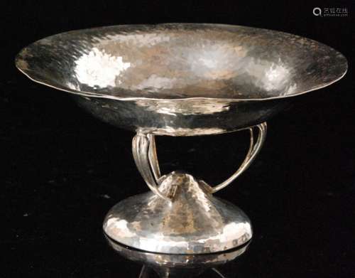 An Arts and Crafts planished pedestal dish