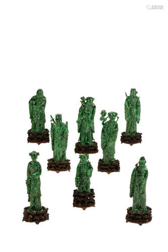 RARE SET OF EIGHT CARVED CHLOROMELANITE IMMORTALS, QING DYNASTY, 19TH CENTURY