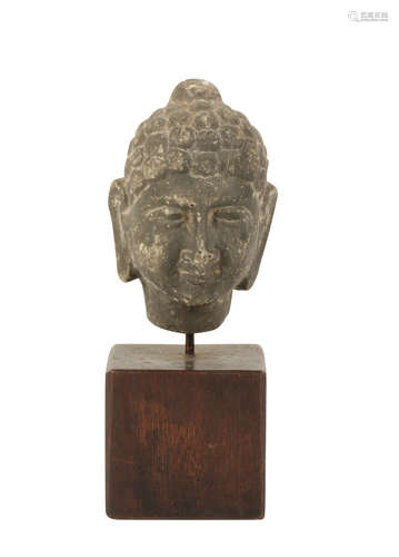 SANDSTONE HEAD OF A BUDDHA, INDIAN 11TH / 12TH CENTURY OR LATER