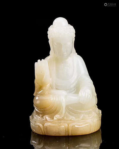 A HETIAN JADE BUDDHA FIGURE