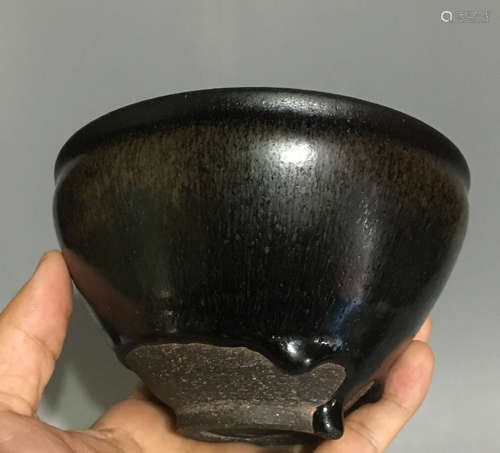 A BLACK GLAZED BOWL