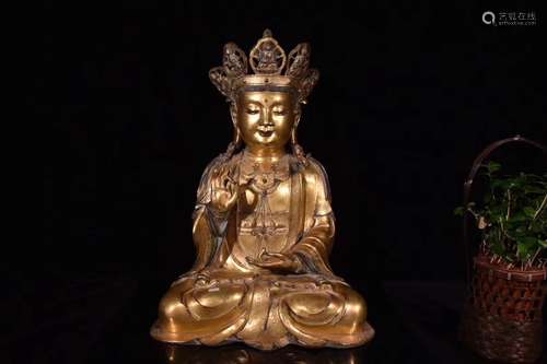 A GLIT-BRONZE GUANYIN FIGURE