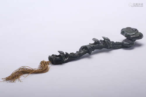 Chinese carved spinach jade Ruyi scepter.