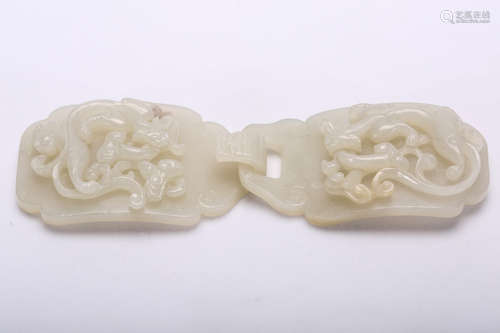 Chinese carved white jade belt buckle.