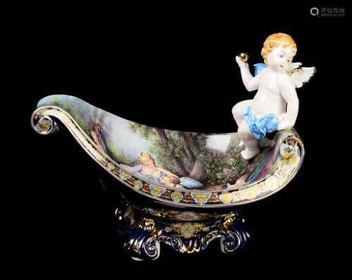 A Continental Porcelain Cobalt Blue Boat Shaped Compote with Painting and Cherub