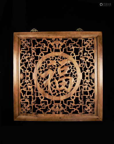 A Chinese Fragrant Camphor Wood Hanging Panel with Hollow-Out Carved Foo Character
