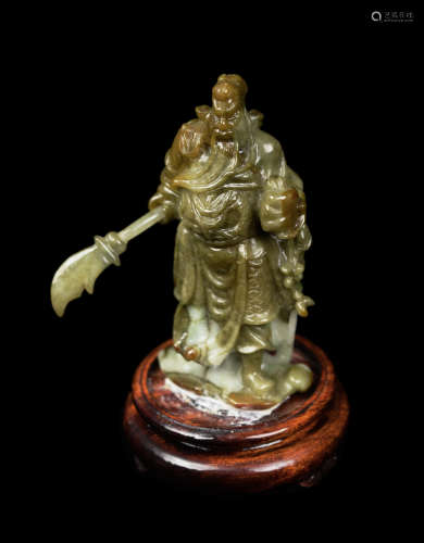A Chinese Xiuyan Jade Guangong Figurine