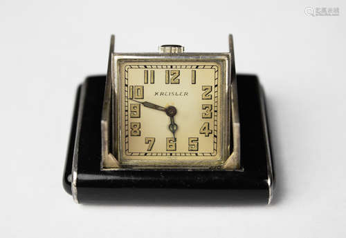 A Kreisler Art Deco Travel Clock/Purse Watch with Onyx Exterior and Sterling Silver Interior