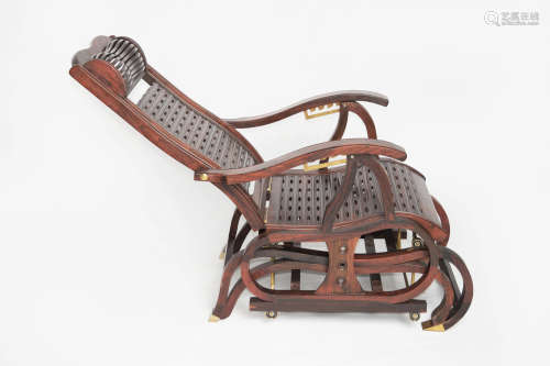 A Chinese Red Siamese Rosewood (Suanzhi) Rocking Chair with Adjustable Back