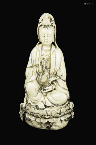A Republic Era Chinese Dehua White Porcelain Ruyi Guanyin Figurine