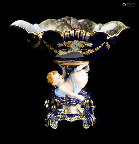 A Continental Cobalt Blue Porcelain Wavy Edge Compote with Cherub and Painting
