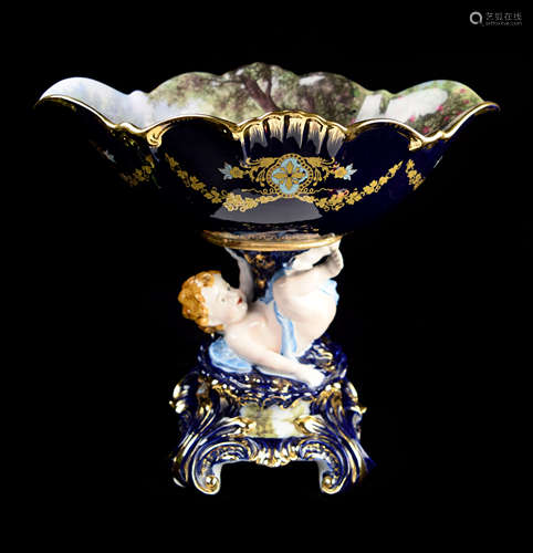 A Continental Cobalt Blue Porcelain Wavy Edge Compote with Cherub and Painting