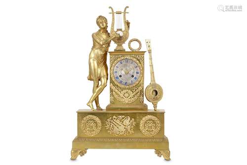 AN EARLY 19TH CENTURY FRENCH EMPIRE PERIOD GILT BRONZE CLOCK DEPICTING APOLLOthe standing figure strumming his lyre