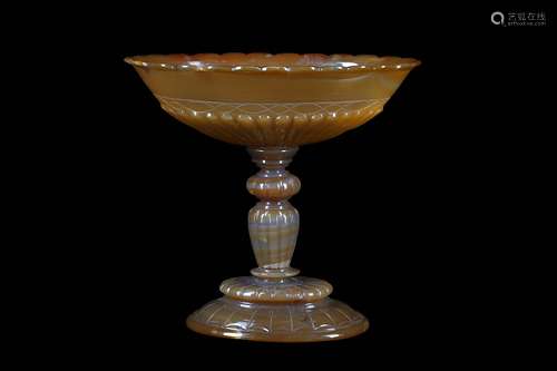 A 19TH CENTURY GERMAN CARVED AGATE TAZZAthe shallow bowl with scallop edge and lobed base