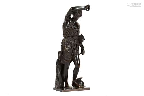 AFTER THE ANTIQUE: A 19TH CENTURY FRENCH BRONZE FIGURE OF DIANA THE HUNTRESS ATTRIBUTED TO BARBEDIENNE the standing figure with a plumed helmet at her feet