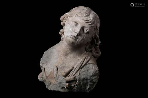 A 17TH CENTURY ITALIAN TERRACOTTA BUST OF AN ANGEL his eyelids delineated and lips slightly parted