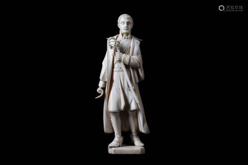 A 19TH CENTURY IVORY FIGURE OF A NAPOLEONIC OFFICERthe standing figure holding a scroll in one hand and his sword in the other