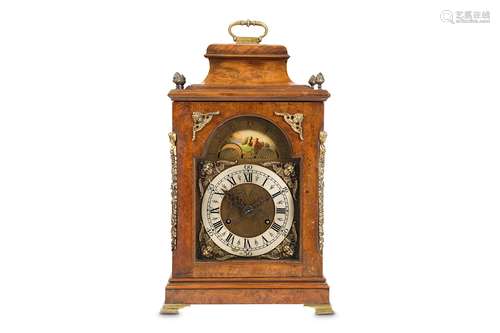 A GEORGE III STYLE BURR WALNUT AND BRASS MOUNTED TABLE CLOCK WITH MOONPHASEthe inverted bell top over the carved and pierced side frets