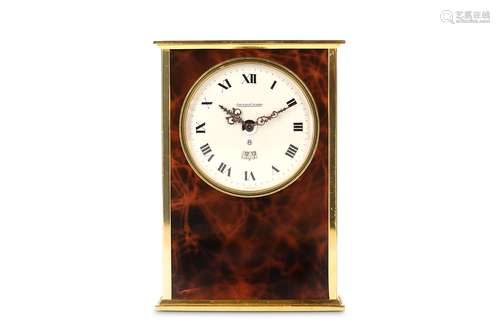 A 1970'S SWISS JAEGER LECOULTRE POLISHED BRASS AND FAUX TORTOISESHELL MUSICAL ALARM CLOCKthe case of rectangular plinth form