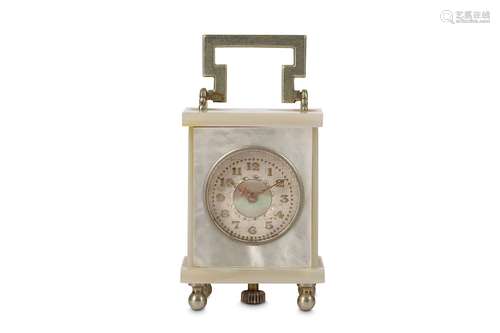 AN EARLY 20TH CENTURY SWISS MOTHER OF PEARL AND SILVERED SUB MINIATURE TRAVELLING CLOCKthe mother of pearl case surmounted by an unmarked silvered metal swing handle