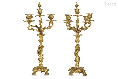 A PAIR OF LATE 19TH / EARLY 20TH CENTURY FRENCH GILT BRONZE CANDELABRA IN THE MANNER OF MEISSONIERin the Rococo style