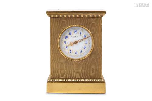 AN EARLY 20TH CENTURY SWISS GILT BRONZE MINIATURE TRAVELLING / CARRIAGE CLOCK RETAILED BY J.W. BENSONof rectangular form with a dentil cornice and plinth