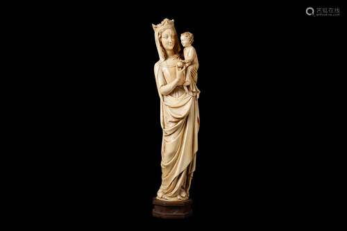 A LARGE 19TH CENTURY FRENCH (DIEPPE) CARVED IVORY FIGURE OF THE VIRGIN AND CHILD IN THE GOTHIC STYLEcarved in the full round