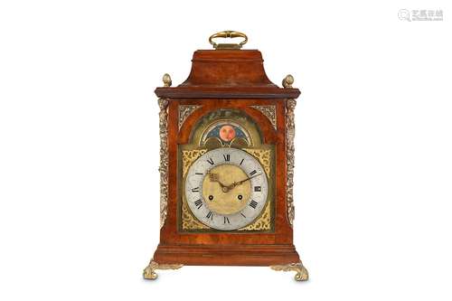 A GEORGE III STYLE WALNUT AND BRASS MOUNTED MOONPHASE TABLE / BRACKET CLOCK the inverted bell top with brass swing handle over