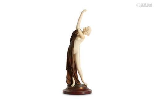 ERNST SEGER (GERMAN: 1868-1939): A CARVED IVORY AND BRONZE FIGURE OF A GIRL 'AFTER THE BATH'the semi-clad girl with right arm raised as she pulls on her gown