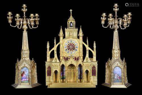 A LARGE MID 19TH  CENTURY FRENCH LOUIS PHILIPPE GILT BRONZE AND BERLIN PORCELAIN CLOCK GARNITURE SIGNED 'ANDRE HOFFMAN'the clock case in the Neo-Gothic style