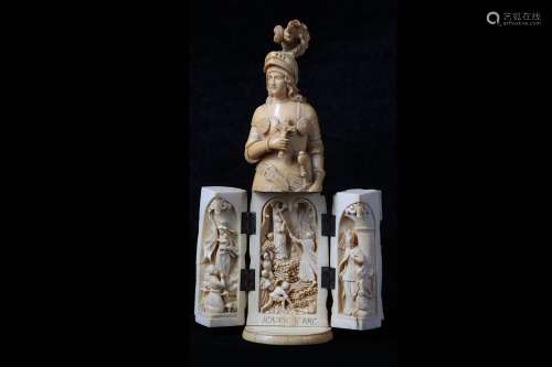 A 19TH CENTURY DIEPPE IVORY TRIPTYCH FIGURE OF JOAN OF ARCthe standing figure holding a shield in her left hand and a crucifix in her right
